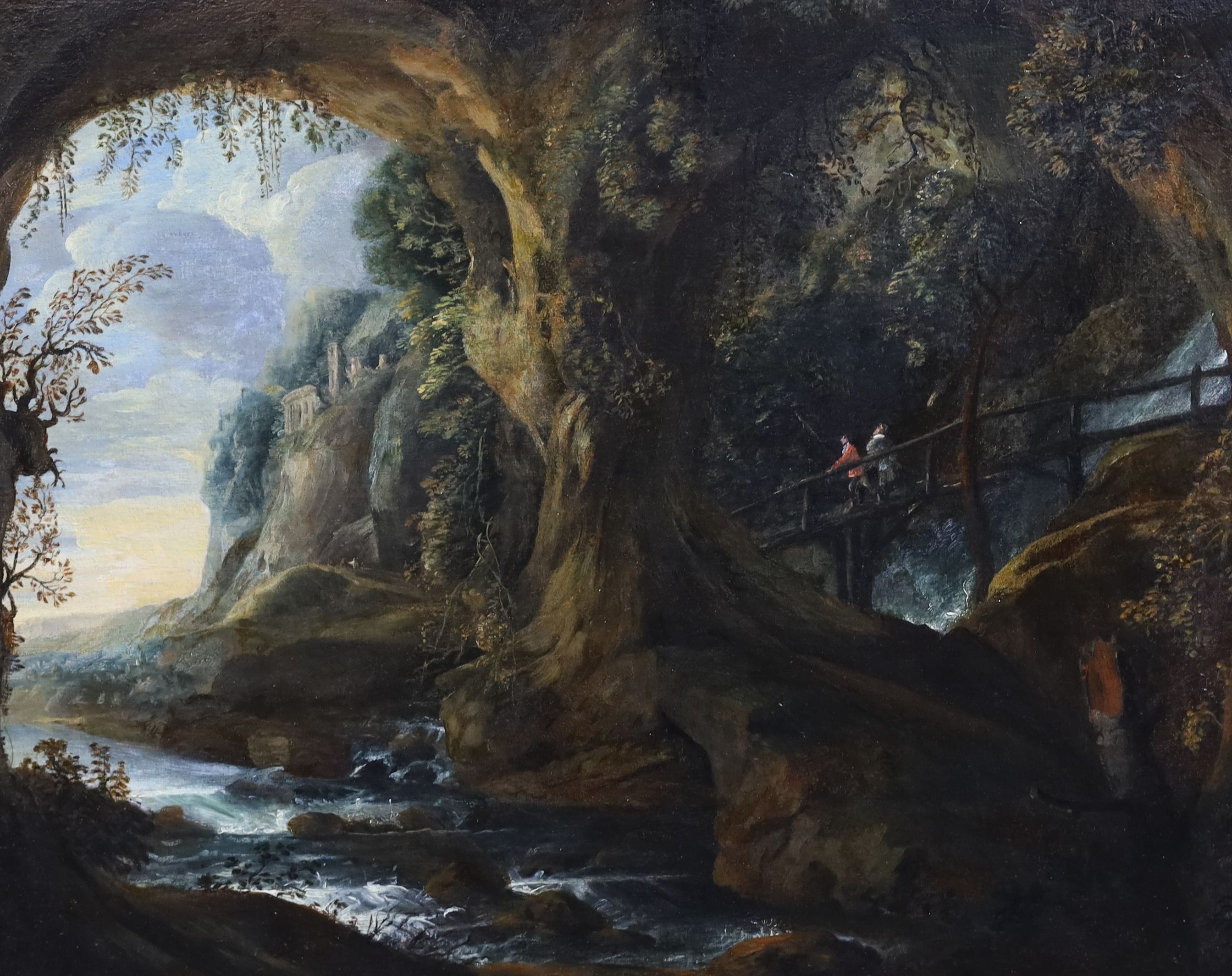 Early 19th century Italian School, Travellers looking out from a grotto, oil on canvas, 57 x 71cm